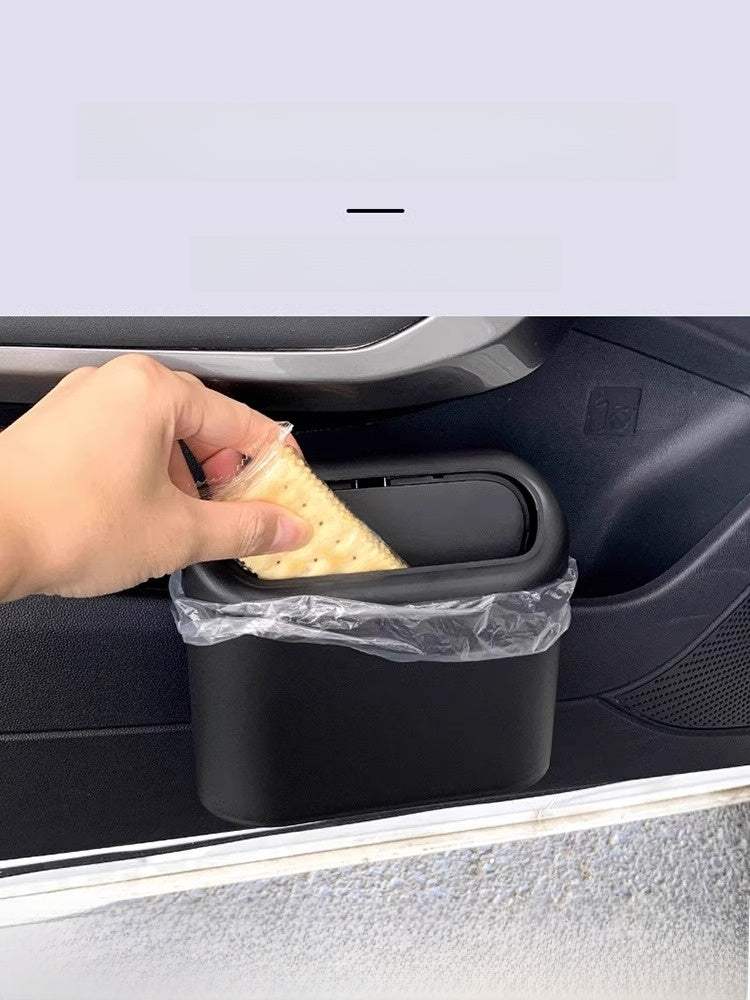 
                  
                    Hanging storage box used as a car trash can in a vehicle door storage bin.
                  
                