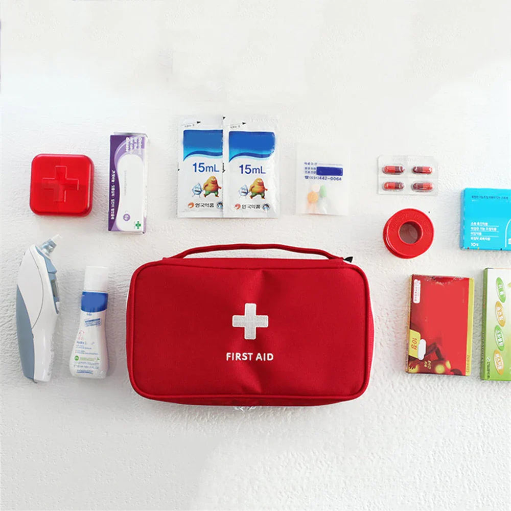 
                  
                    Emergency medical first aid kit with waterproof pouch and supplies.
                  
                