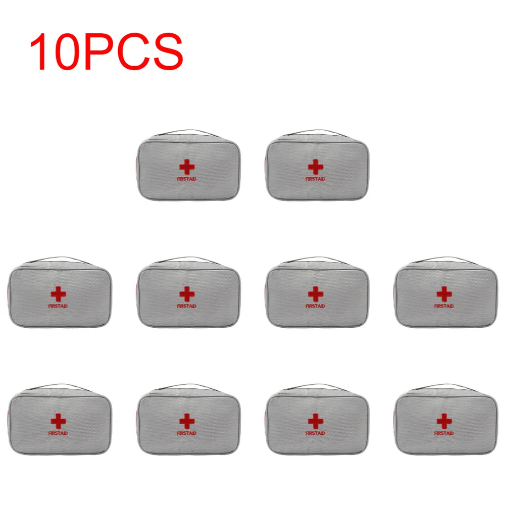 
                  
                    10 portable emergency medical first aid kits with red cross symbols.
                  
                