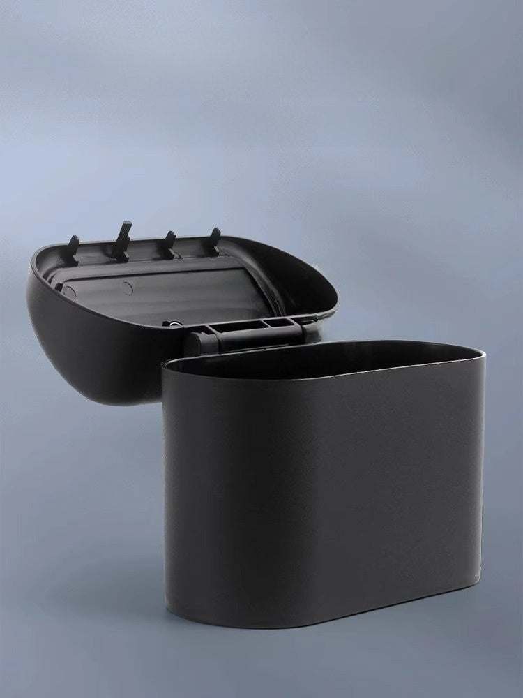 Hanging storage box and car trash can with open lid in sleek black design.