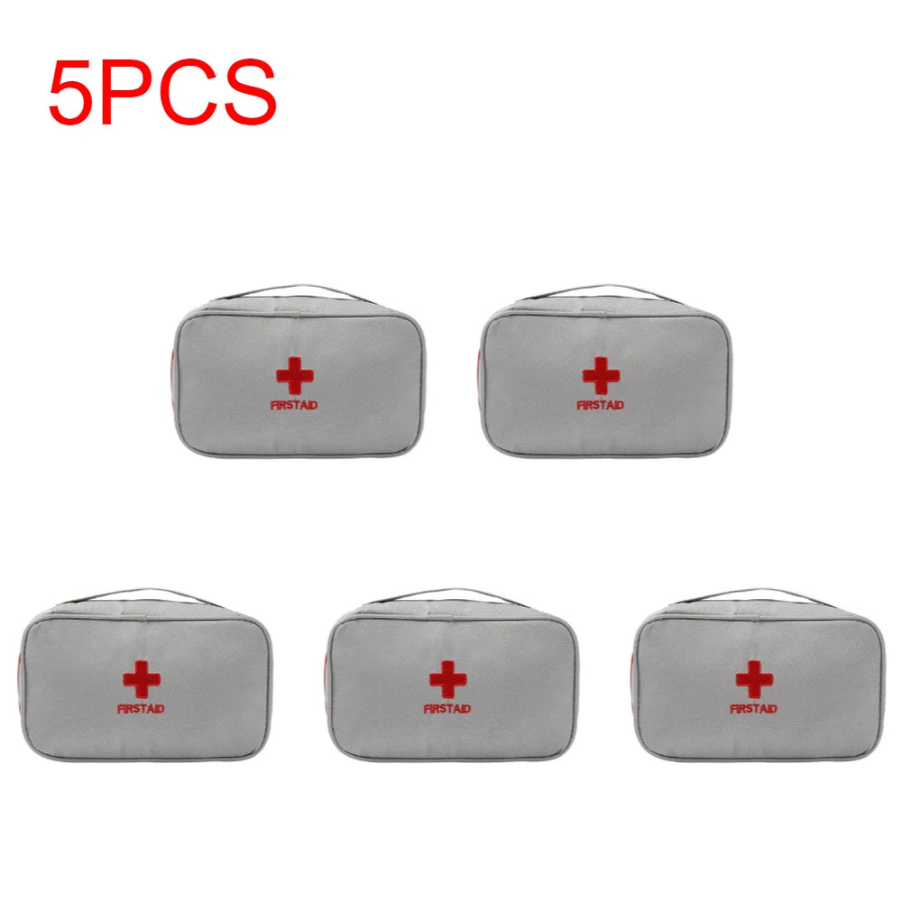 
                  
                    5-piece portable emergency medical first aid kit with handle, waterproof gray pouches.
                  
                