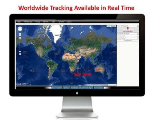 
                  
                    Real-time GPS vehicle tracker on monitor displaying worldwide map tracking.
                  
                